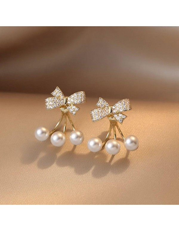 Jewels Galaxy Gold Plated Korean Bow Tie Pearl Stud Earrings