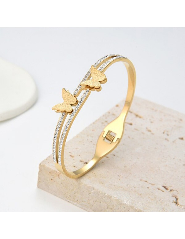 Jewels Galaxy Stainless Steel Gold Plated Butterfly inspired American Diamond Studded Bracelet