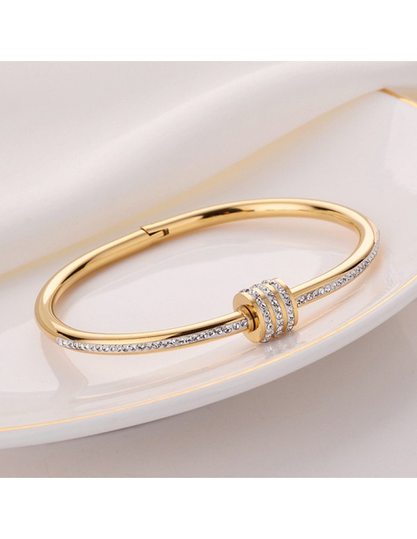 Jewels Galaxy Stainless Steel Gold Plated American Diamond Studded Bangle Style Bracelet