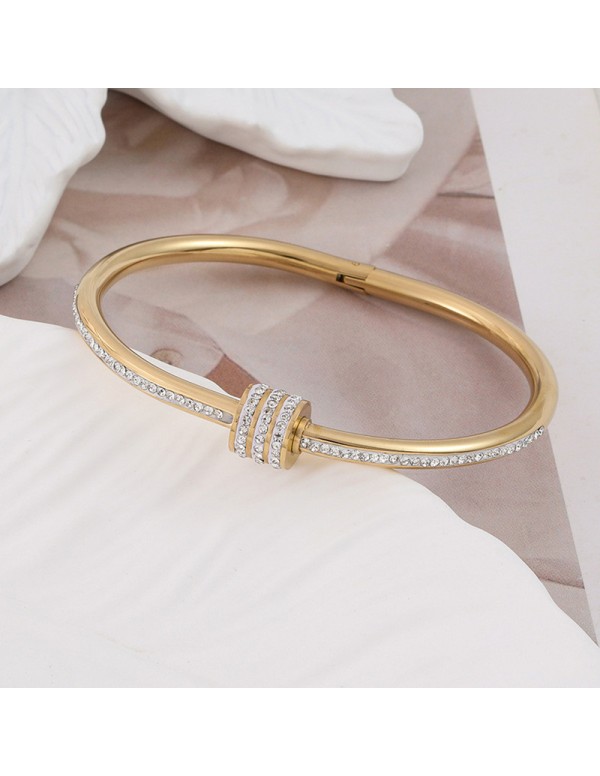 Jewels Galaxy Stainless Steel Gold Plated American Diamond Studded Bangle Style Bracelet