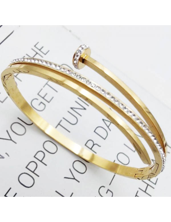 Jewels Galaxy Stainless Steel Gold Plated American Diamond Studded Nail inspired Bracelet