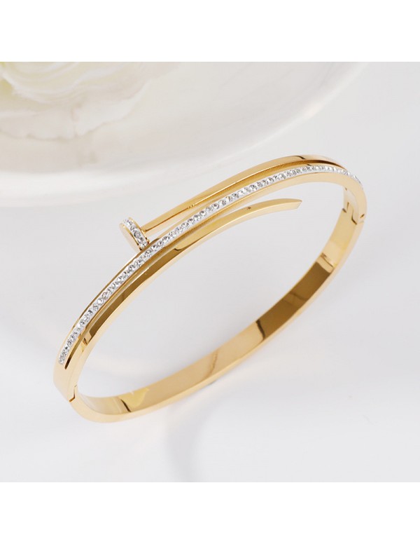 Jewels Galaxy Stainless Steel Gold Plated American Diamond Studded Nail inspired Bracelet