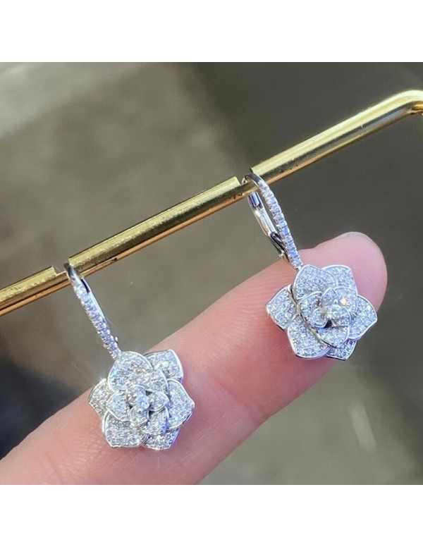 Jewels Galaxy Silver Plated American Diamond Studded Floral Rose themed Drop Earrings