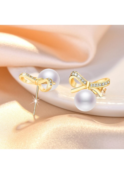 Jewels Galaxy Gold Plated American Diamond Studded Bow-Tie Shape Korean Stud Earrings