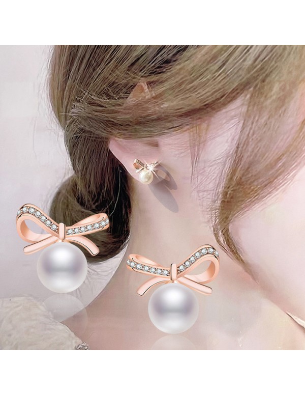Jewels Galaxy Rose Gold Plated American Diamond Studded Bow-Tie Shape Korean Stud Earrings