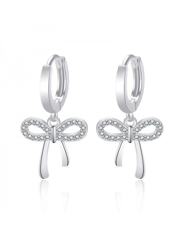 Jewels Galaxy Silver Plated American Diamond Studded Bow-Tie Shape Korean Stud Earrings
