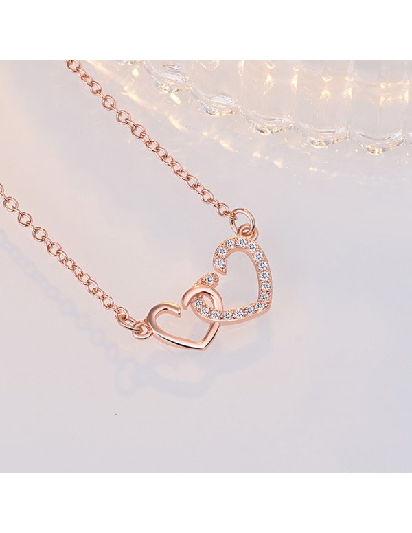 Jewels Galaxy Rose Gold Plated American Diamond Studded Dual Heart Contemporary Korean Pendant