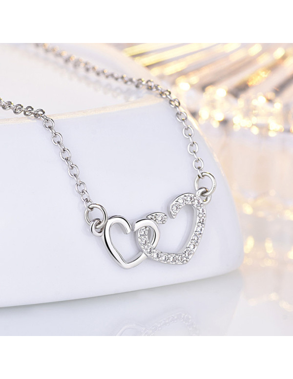 Jewels Galaxy Silver Plated American Diamond Studded Dual Heart Contemporary Korean Pendant